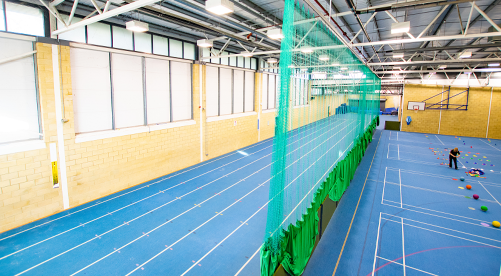 Mixed use space, including indoor athletics track and sports courts
