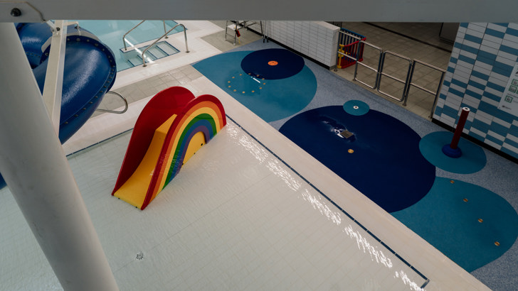 Sensory splash area with rainbow slide