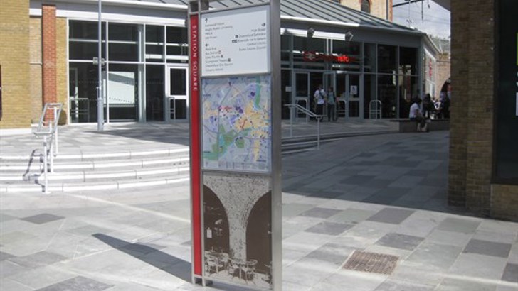 Public information board, including map, outside Chelmsford railway station