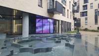 Video screens on the ground floor window to the tower overlooking the saltmarsh pool preview