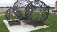 Three large metal spheres made of smaller circles preview