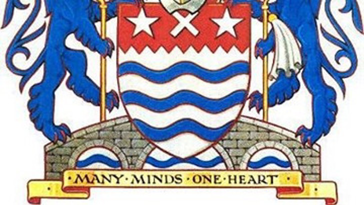 Chelmsford coat of arms, featuring three-arched bridge, as well as motto of 'Many minds one heart'