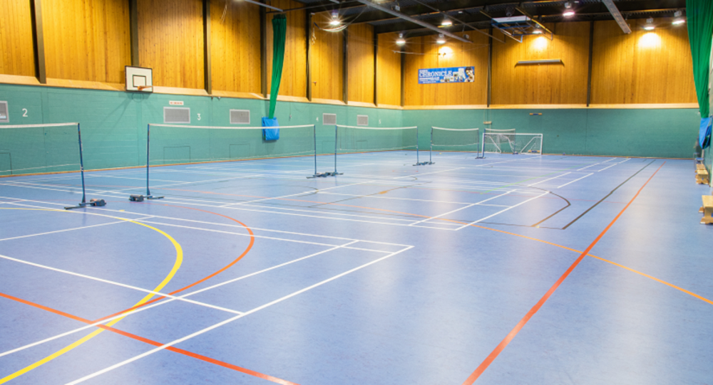 Sports hall laid out for badminton