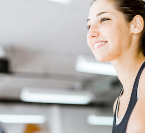 Smiling woman at the gym