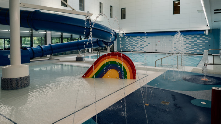 Sensory splash area with rainbow slide