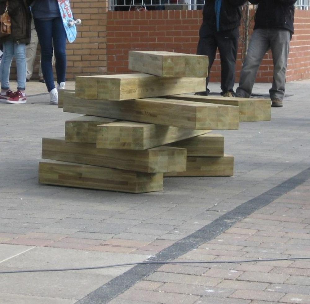 Seating in the form of a stack of timbers