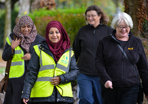 Group od ladies walking in a suburban area