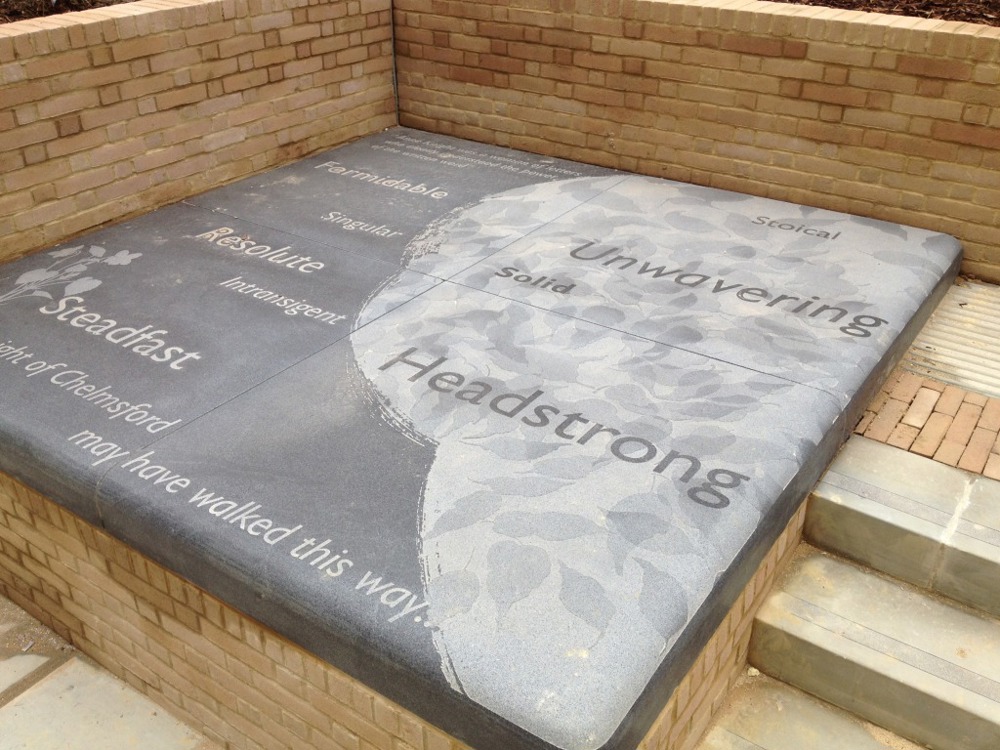 Word engraved into stone step, such as 'unwavering', 'solid' and 'headstrong'